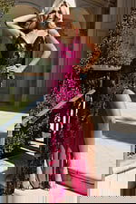 Sequin fitted gown with V-neckline and high slit