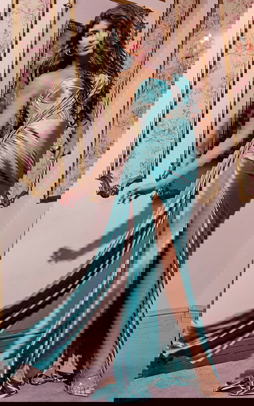 Model wearing Jovani 42210 dress with a high slit and sweetheart neckline, front view.