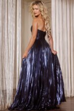 Model in Jovani 42335 navy gown with sweetheart neckline and floral detailing, front view.