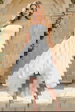 Strapless high low white bridal dress with voluminous bubble hem and fitted bodice