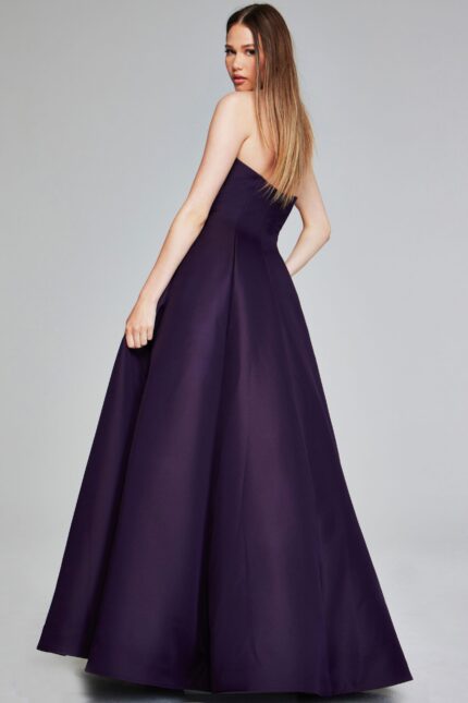 Model wearing Jovani 42347 purple strapless A-line evening gown, back view