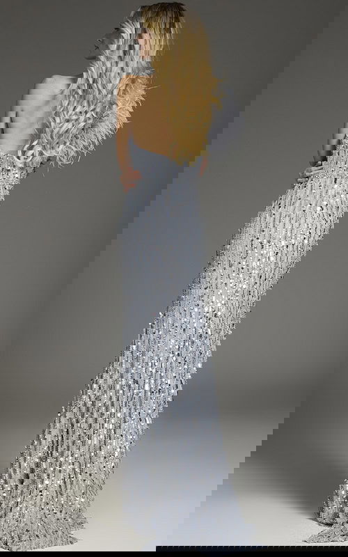 Back view of model wearing Jovani 42426, featuring the elegant drape and sequins.