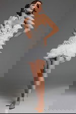 Model wearing Jovani 42536 dress in ivory, front view with sweetheart neckline and floral appliqués.