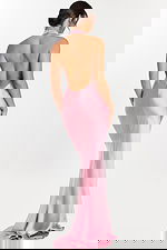 Back view of low open-back mauve gown with elegant train.