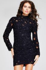 Model wearing Jovani 42576 black dress, front view emphasizing floral appliqués.