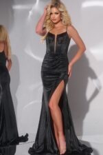 Model posing in Jovani 42639 black gown showcasing high slit and V-neckline.
