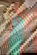 Model wearing Jovani 42677 green gown close-up of the one-shoulder design