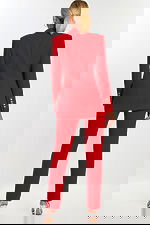 Back view of tailored red blazer and pants