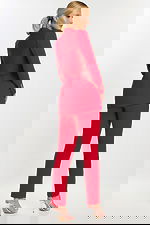 Side-back view of red suit with crystal cuff buttons