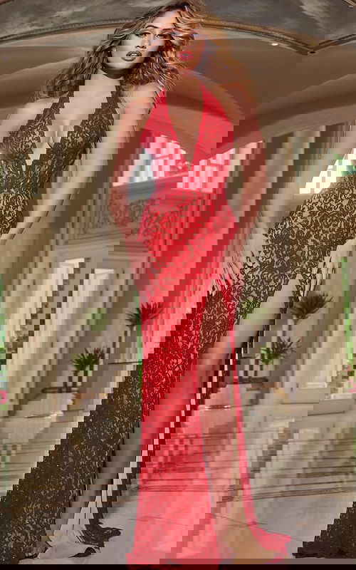 Model wearing Jovani 42724, a long red gown with a high slit and deep V-neckline.