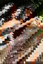 Gold and bronze formal dresses featuring ruched designs and sleek silhouettes