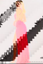 Floor-length fitted dress with open back and side slit