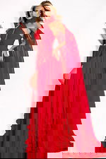 Red chiffon gown with halter neckline and floral cape