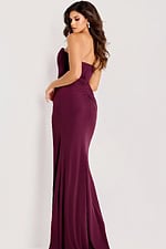 Floor-length burgundy dress with thigh-high slit and fitted silhouette