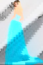 Layered tulle evening dress with high slit and extended train