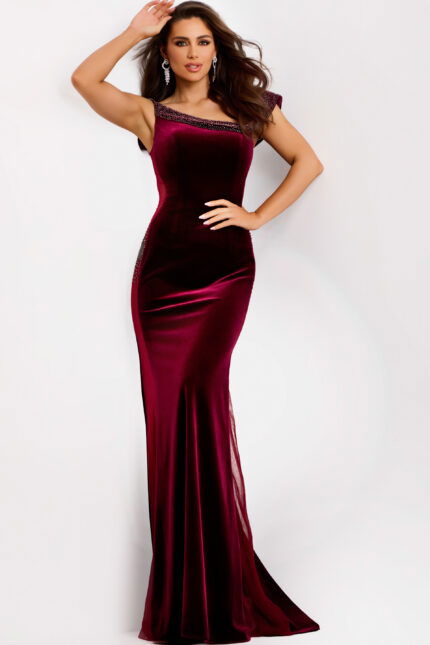 Burgundy velvet gown with one-shoulder neckline and beaded trim