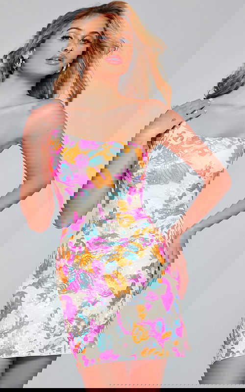 Model wearing Jovani 42996 with vibrant multicolored design from the front.