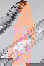 Model showcasing back view of Jovani 42996 with vibrant multicolored pattern.