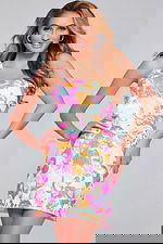 Model wearing Jovani 42996 showcasing a colorful pattern from the front.