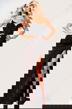 Elegant black evening dress featuring embellished bodice