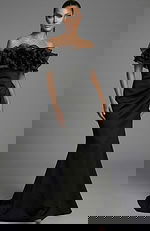 Front view of off shoulder gown with layered ruffled neckline and fitted silhouette