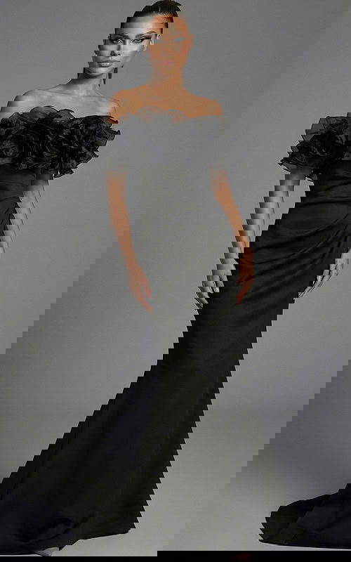 Front view of off shoulder gown with layered ruffled neckline and fitted silhouette