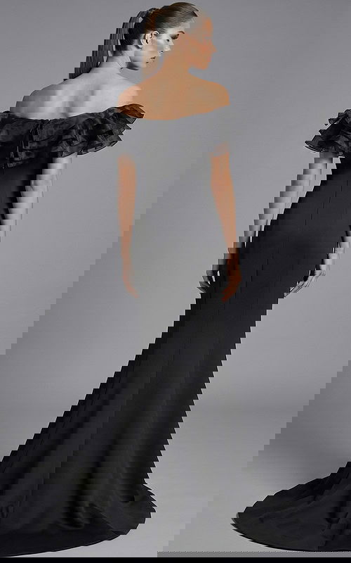 Back view of off shoulder gown with ruffled bodice and smooth flowing skirt