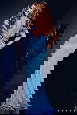 Model wearing Jovani 43033 blue gown, showcasing back view with floor-length silhouette.