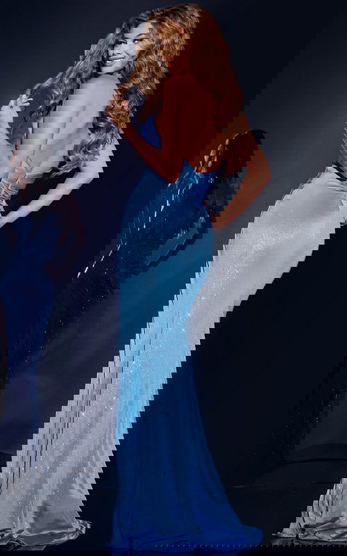 Model wearing Jovani 43033 blue gown, showcasing back view with floor-length silhouette.