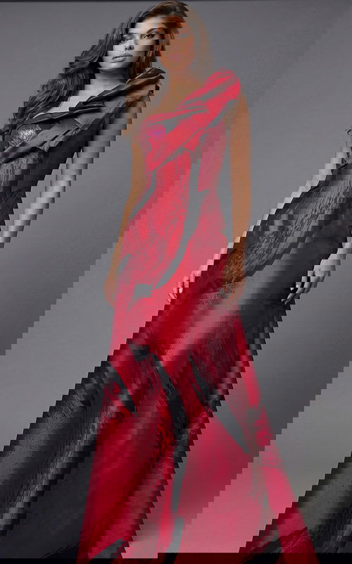 One shoulder gown with sculptural neckline and red abstract print detailing