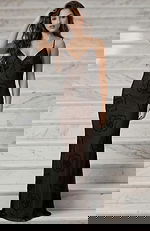 Front view of fitted evening gown with delicate straps and beadwork