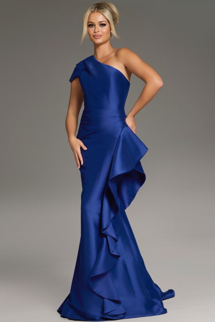 Full-length image of model in Jovani 43126 dress with asymmetrical neckline in purple.