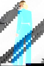 Back view of structured blazer and wide-leg pants in peacock blue