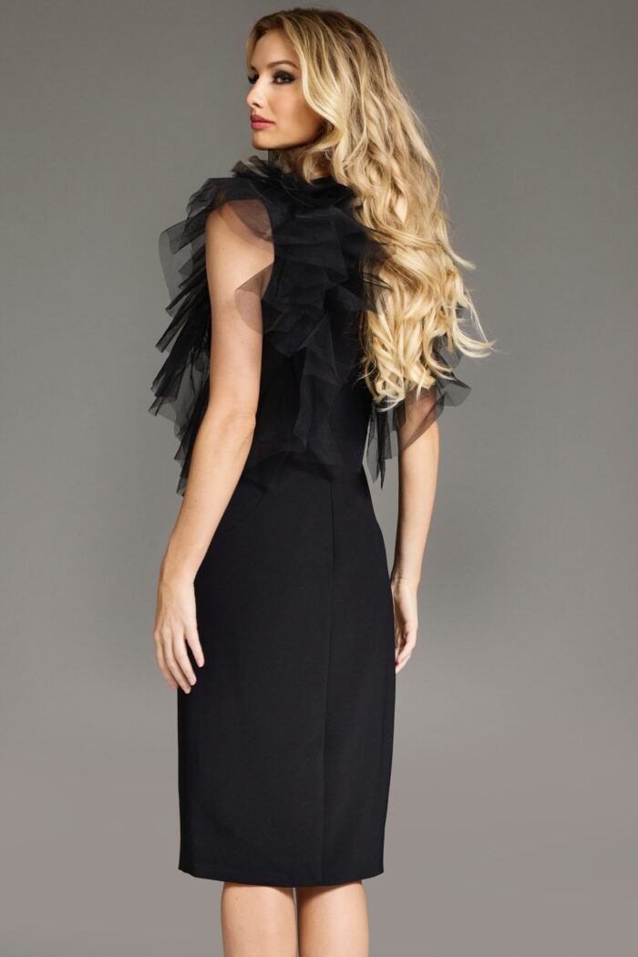 Model wearing Jovani 43152 black dress with ruffle detail, back view