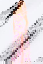 Romantic layered gown with delicate floral appliqués