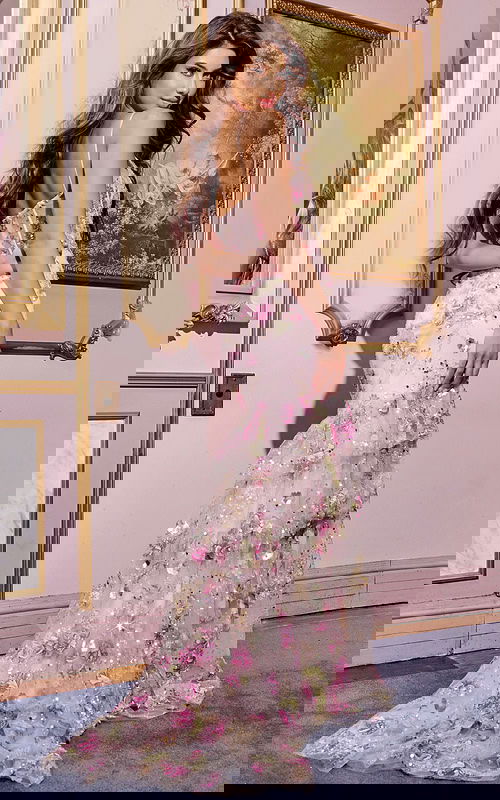 Back view of model in Jovani 43172 pink dress showcasing cascading ruffles