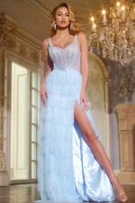 Model wearing Jovani 43193 stunning blue gown with sweetheart neckline and high slit.