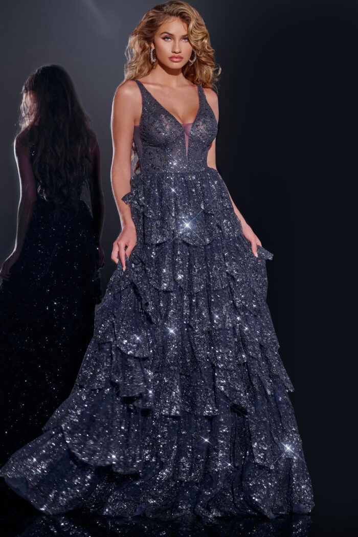 Model wearing Jovani 43198 navy blue sequined gown with plunging neckline front view
