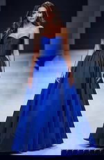 Strapless ball gown with structured bodice, softly gathered waist, and full flowing skirt creating a classic, elegant silhouette