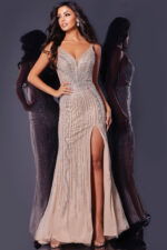 Model showcasing front view of Jovani 43221 silver gown with deep V-neckline.