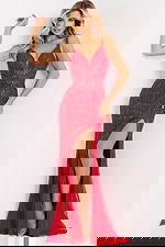 Glamorous red beaded prom dress featuring a plunging V-neckline