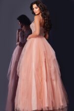 Back view of Jovani 43254 blush gown showcasing beaded details and tulle volume