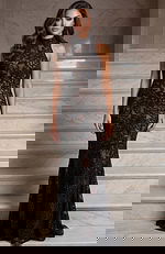 Halter neck lace gown with illusion bodice and fitted silhouette