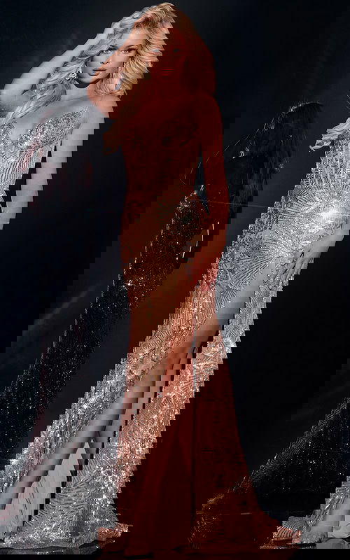 model wearing Jovani 43380 blush dress with sweetheart neckline and high slit