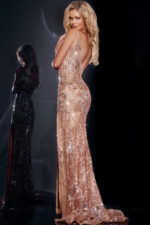 model wearing Jovani 43380 blush dress with low scoop back view