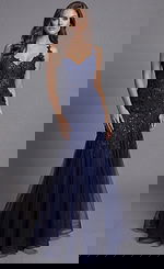 Jovani 43405 navy blue mermaid prom dress with floral lace appliqué straps, sweetheart neckline, sheer illusion side panels, sequin embellishments, and glitter tulle godet skirt.