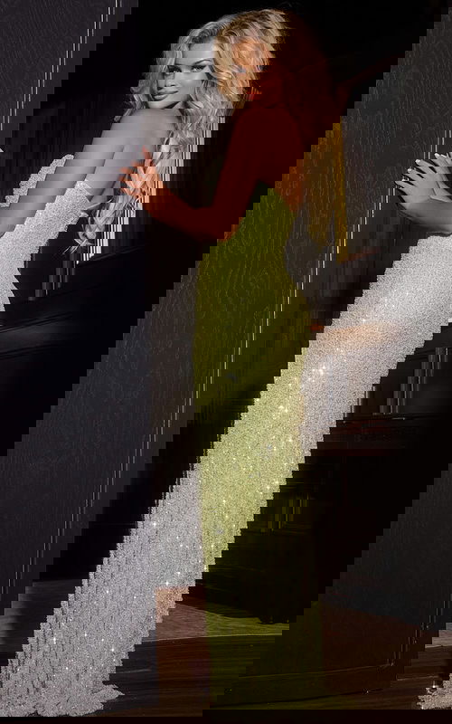 Back view of model wearing Jovani 43441 green gown