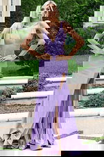 Lavender gown with plunging neckline and sleek fitted silhouette