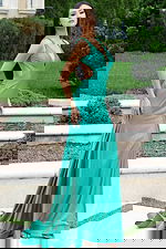 Green shimmer gown with side cutouts and open back design