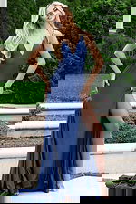 Blue shimmer gown with side slit and flowing hemline